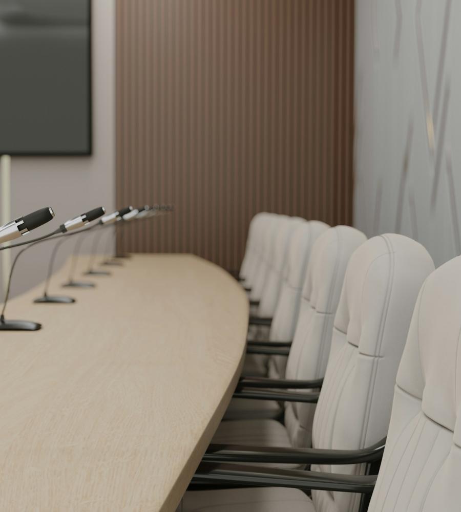 row of chairs and microphones